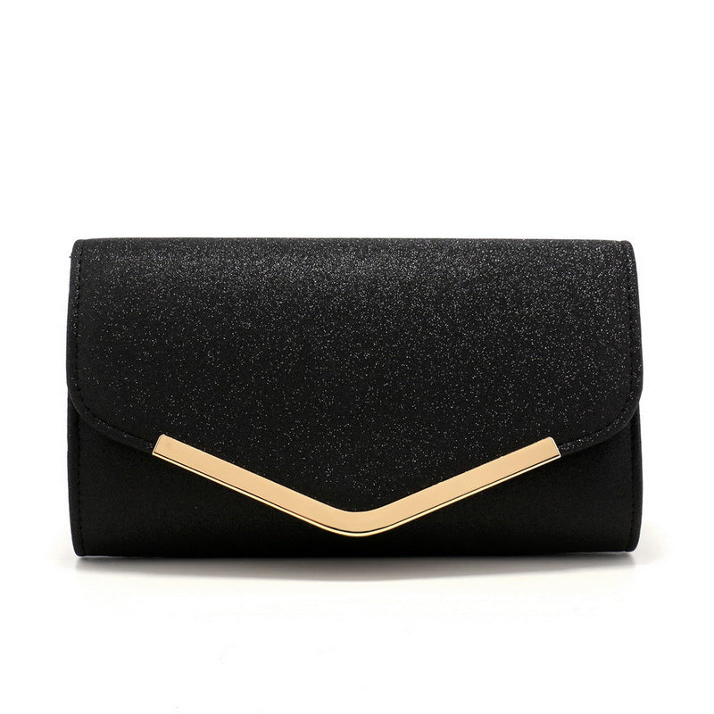 Charlotte Glitzer Ausgangs Clutch – In Schwarz mit goldene Hardware